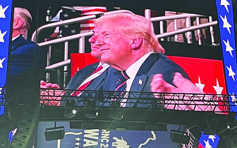Donald Trump takes in a speech at the Republican National Convention on the big screen. CARL BLACKBURN/Submitted
