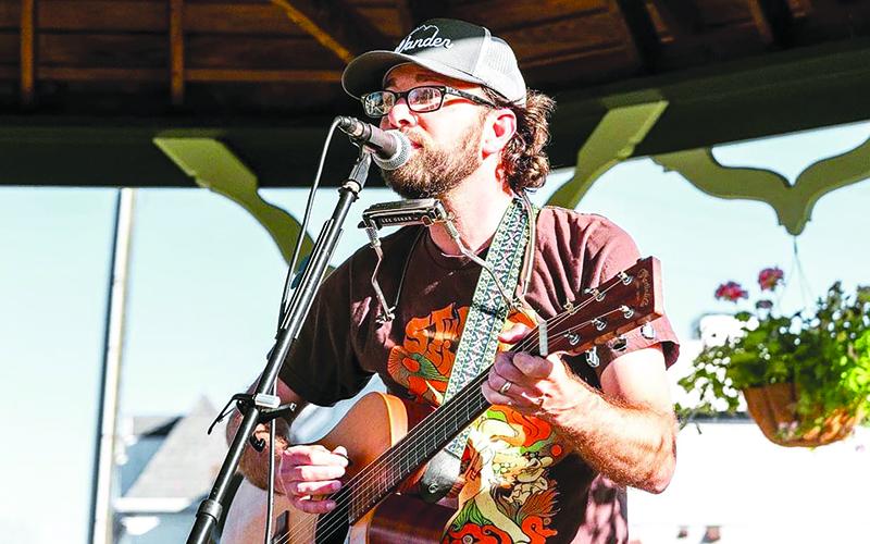 Bryant Tench plays for folks at the Clarkesville gazebo during a recent concert. SUBMITTED