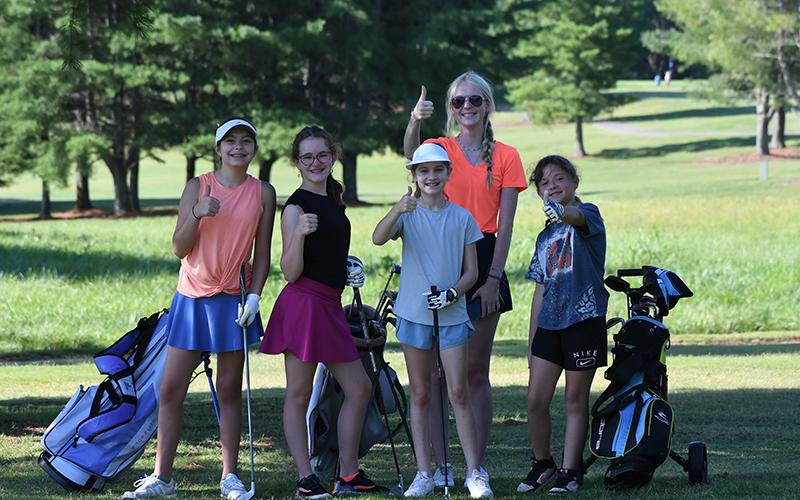 From left, Annalyse Baird,  Adalynn Sheffield, Eva Claire Stephens, HCHS’ Addie Maney, and Brianna  Berrios  enjoying some shade on a hot camp morning at Apple Mountain. LANG STOREY/Staff