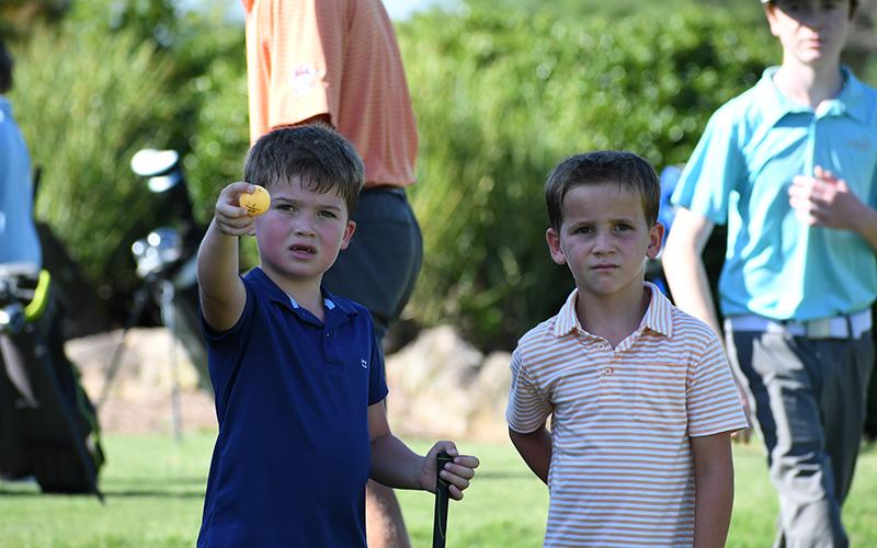 Westynn Tyre (left) and Eli Westmorland showed off inquisitive minds at Raider Golf Camp this week. LANG STOREY/Staff