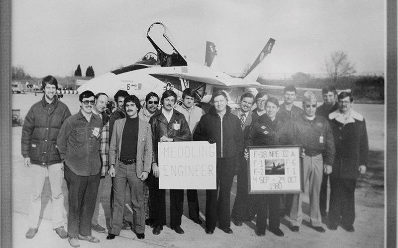 Test flight engineers stood before a F/A-18 Hornet on the tarmac of the NAS Pax River airfield in the 1980s. ZACH TAYLOR/Staff