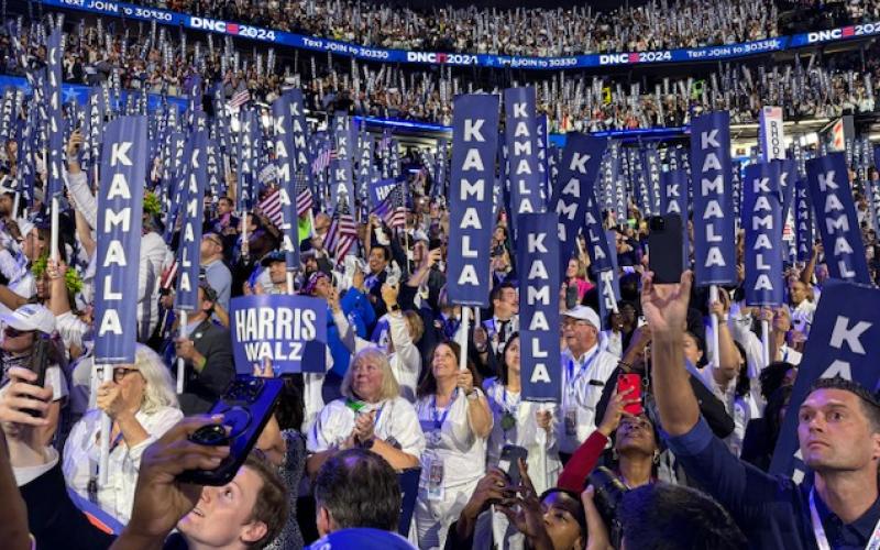 Thousands of supporters of Vice President Kamala Harris’ presidential campaign proudly waved signs and American Flags at the DNC last week. SUBMITTED