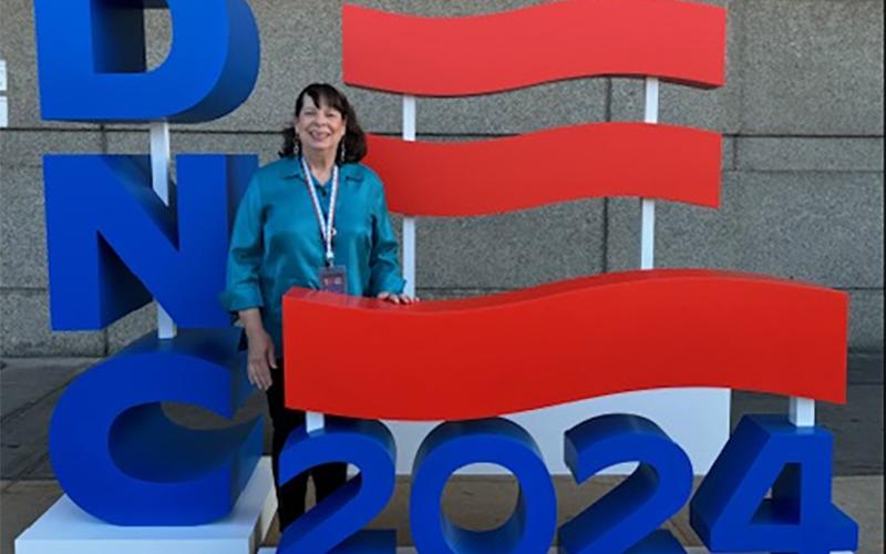 Virginia Webb poses outside of the DNC convention center in Chicago. SUBMITTED