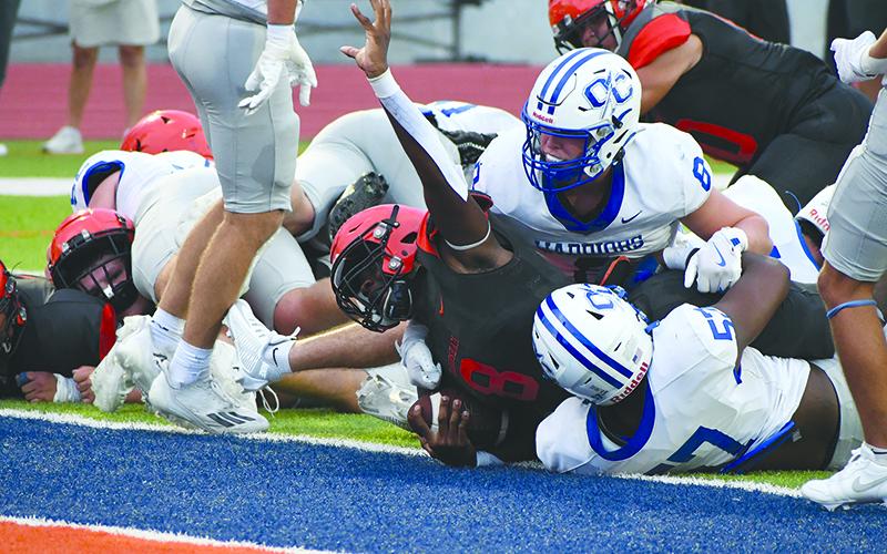 Habersham Central’s Antonio Cantrell plows his way into the end zone for a touchdown on Friday night against Oconee County. LANG STOREY/Staff