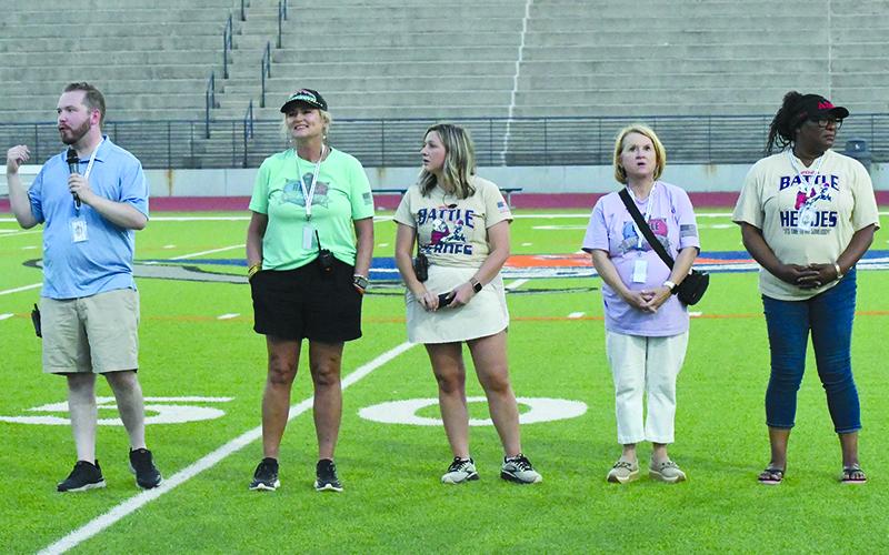 Everett Huffman, Teresa Lizama, Ashley Lizama, Donna Scott and Dr. Monica Cook – who all sit on the Easton Foundation Board of Directors – thanked their supporters on Saturday. LANG STOREY/Staff