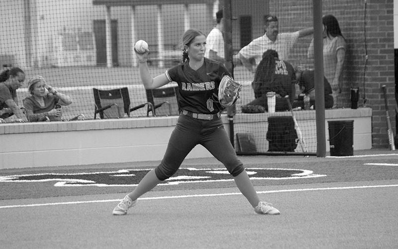 Habersham Central’s Emily Diffenderfer loads up to fire to first during the season opener against White County. MARK TURNER/CNI News Service
