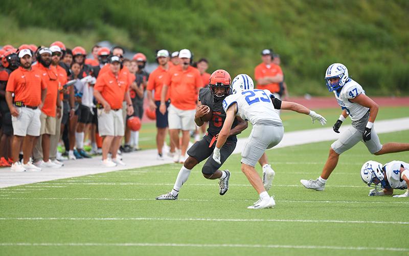Habersham’s Donnie Warren takes on a defender in the Raiders’ scrimmage on Aug. 2. TOM ASKEW/Special