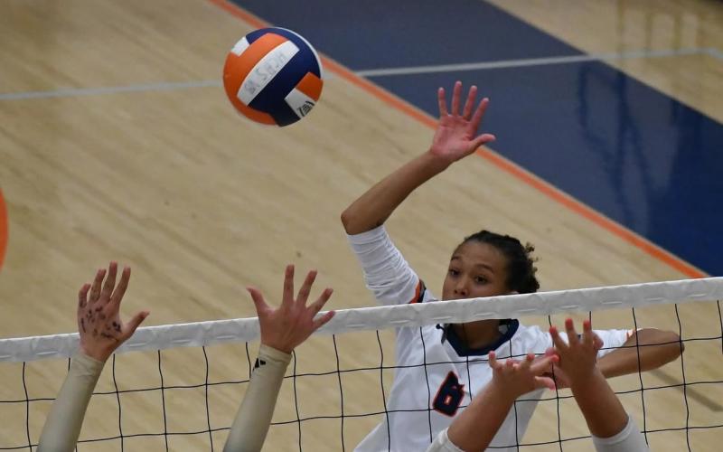McKenzie King defends the net during a match earlier this season. LANG STOREY/Staff