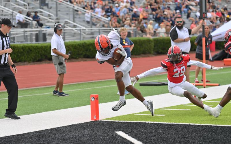 Donnie Warren finds the endzone during the game Saturday. TOM ASKEW/Special