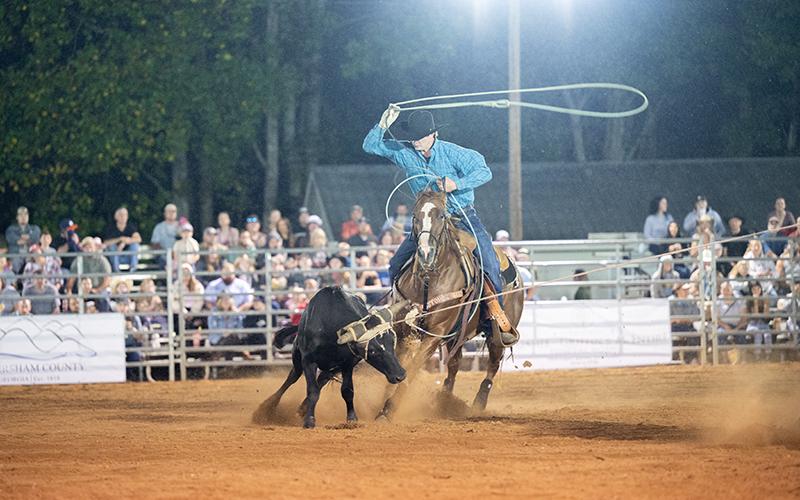 Tyler and Trevor Boatwright set a time of 6.1 to win the weekend in team roping. The brothers were the most cohesive team in the arena on Friday night. Trevor Boatwright is getting the heel toss lined up. ZACH TAYLOR/Staff