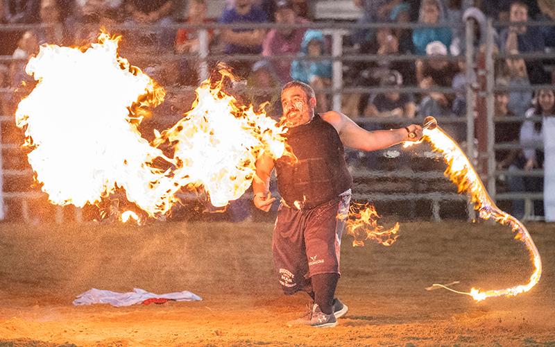 The rodeo clown, Porkchop, gets the Clarkesville rodeo fans fired up on night one of the Chattahoochee Mountain Fair Rodeo. ZACH TAYLOR/Staff