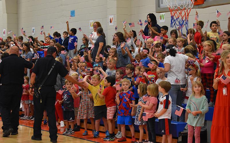 Students at Fairview lined the gymnasium on Wednesday to honor local first responders. JULIANNE AKERS/Staff