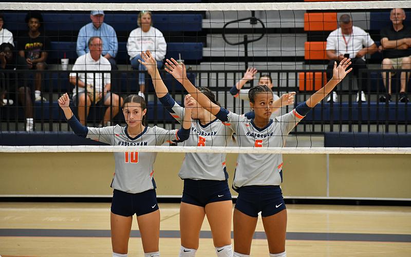 The HCHS volleyball team was back in Mt. Airy this week to defend their home court. Pictured here are Ava Saxon and McKenzie King. LANG STOREY/Staff