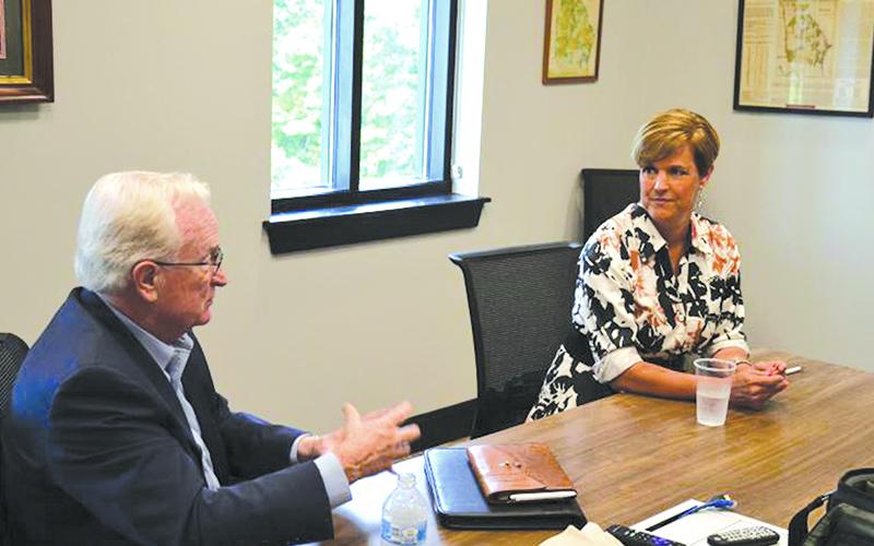 Habersham County Manager Alicia Vaughn chats with former County Manager Phil Sutton in 2021. Vaughn will leave the position in December. FILE PHOTO