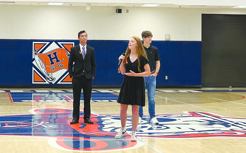 Elloree Chambers, center, addressed more than 200 students at Habersham Central on Sept. 20 in a stand against gun violence. Behind her stand fellow students Isaac McDougal, left, and Jack Garrett, right. SUBMITTED