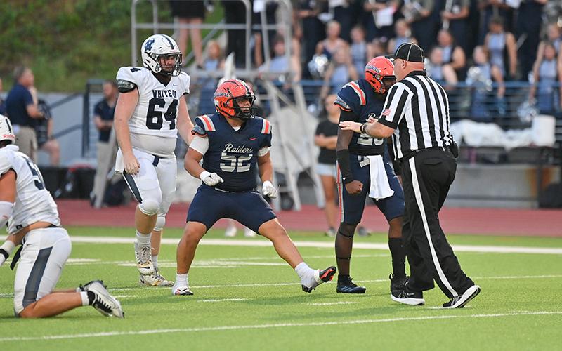 Anthony Garrido (No. 52) celebrates a big defensive play against White County last week. TOM ASKEW/Special