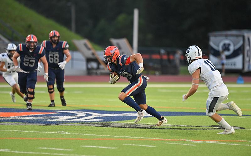 Everett Rudeseal darts upfield after a catch last week. TOM ASKEW/Special