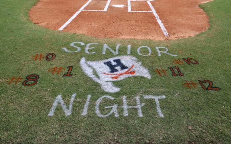 The HCHS softball field was painted to honor the Lady Raiders’ six seniors: Emily Diffenderfer (0), Ella Diffenderfer (1), Brooke Barbour (8), Shelby Rinefierd (10), Karsen Wade (11), and Emilee Oliver (12).