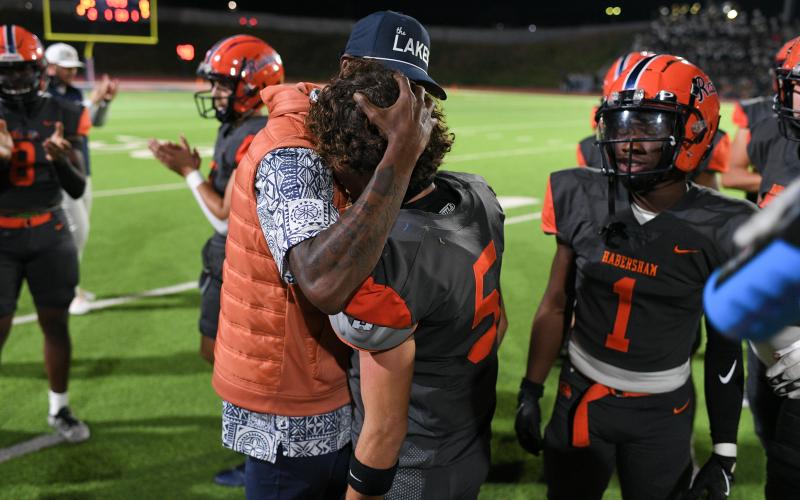 Tavarres King congratulates WR Zeke Whittington after Whittington became HCHS' all-time receiving yards leader Friday night. TOM ASKEW/Special