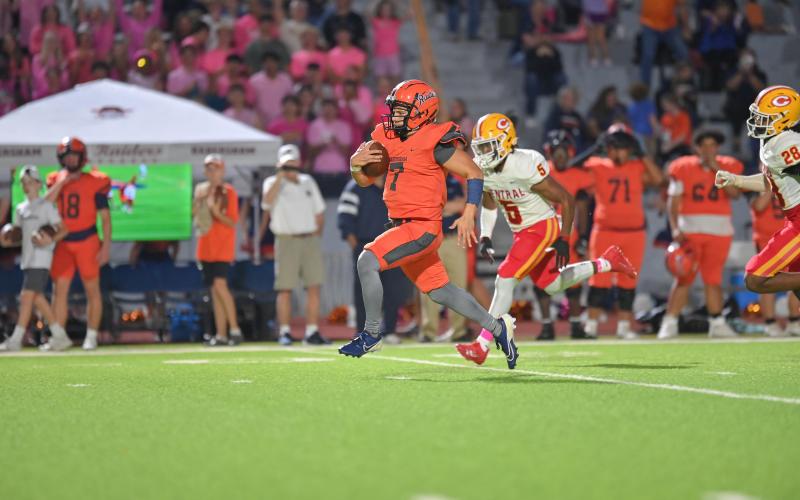 Paris Wilbanks escapes for a 51-yard touchdown run early in Friday's game against Clarke Central. TOM ASKEW/Special
