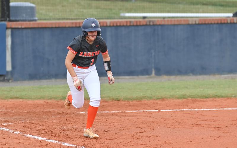 Kayla Stevens takes off down the line after smacking a ball into play. TOM ASKEW/Special