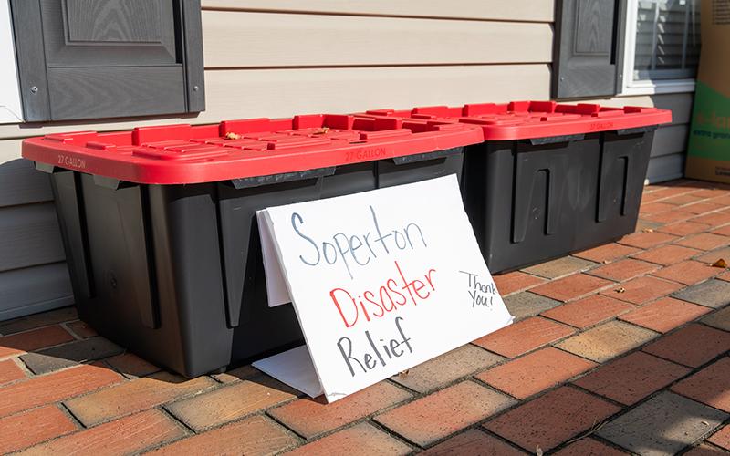 Boxes of donations sit on the front porch at the Habersham Chamber of Commerce bound for Soperton, Ga. ZACH TAYLOR/Staff