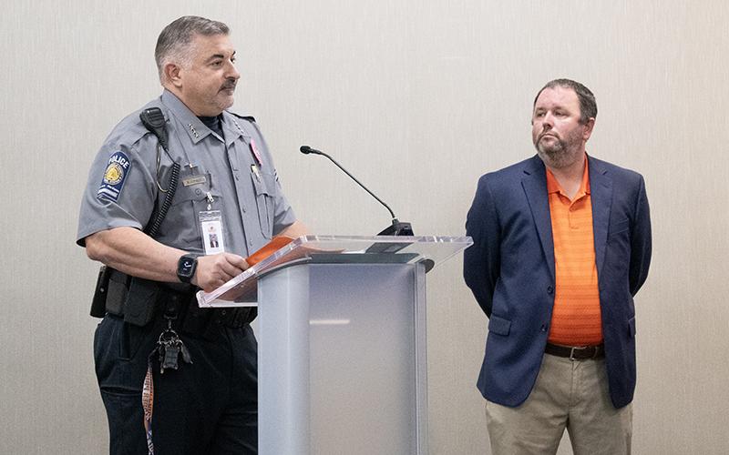 Habersham County Schools Director of School Safety Murray Kogod, left, speaks at the board of education’s work session on Tuesday about the benefit of Centegix, a wearable alert system for educators. Right, Assistant Superintendent Patrick Franklin listens. JULIANNE AKERS/Staff