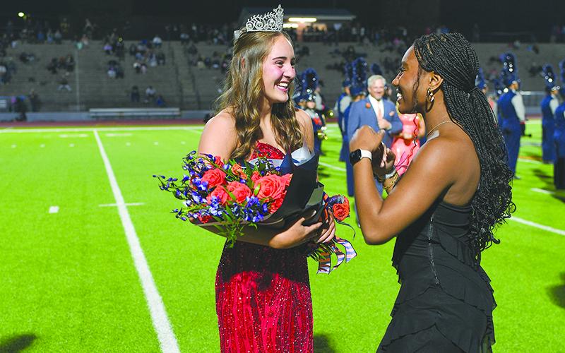 2023 Homecoming Queen Amayah Dooley places the crown on 2024 Homecoming Queen Molly Tipton.  TOM ASKEW/Special