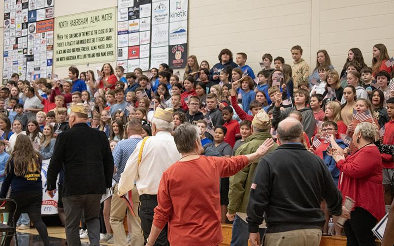 Veterans received a warm welcome from North Habersham Middle School students during their entrance to Monday morning’s Veterans Day program. JULIANNE AKERS/Staff