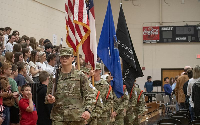 Elisha Dailey leads the Habersham Central High School JROTC for the Presentation of  Colors at North Habersham Middle School’s Veterans Day program. JULIANNE AKERS/Staff