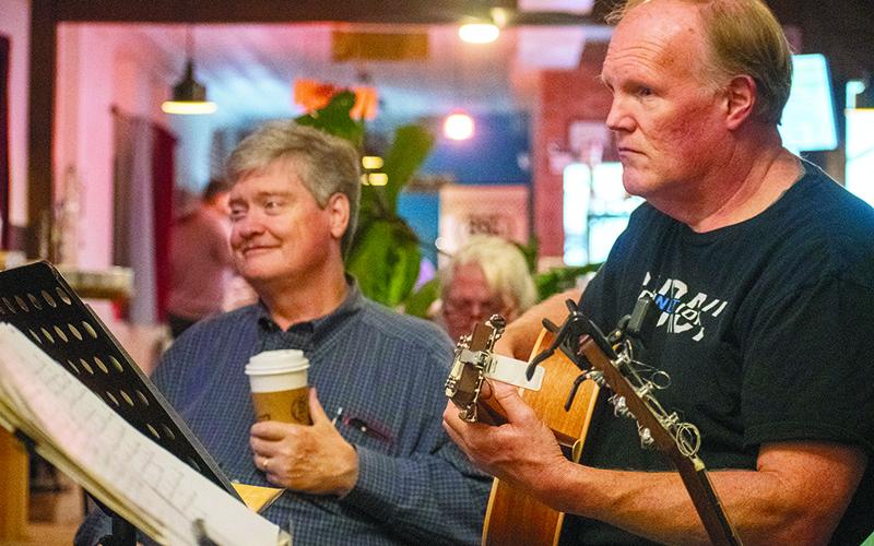Jimmy Maness and Stan Crump share a laugh while Crump sings “Oh, Pretty Woman” by Roy Orbison. JULIANNE AKERS/Staff