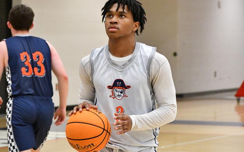 HCHS senior guard Justus Gober got some free throws up at practice this week. LANG STOREY/Staff