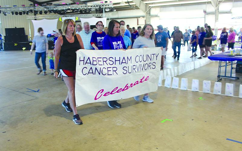 Cancer survivors walk together in Habersham County. SUBMITTED