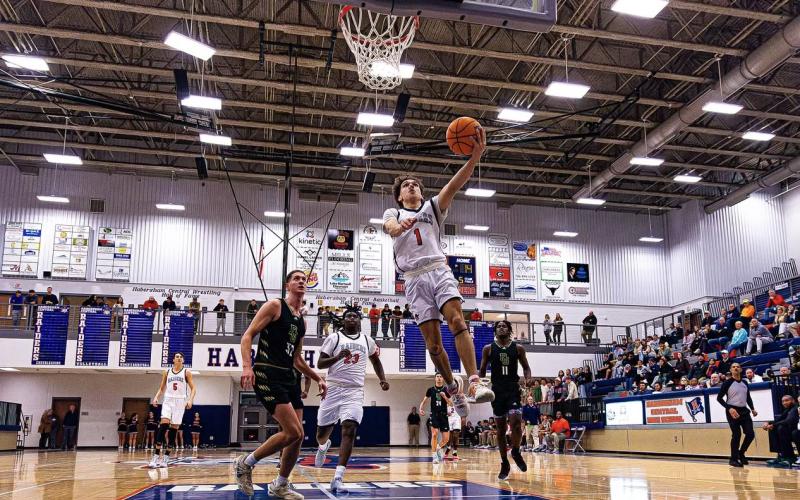 Senior guard Caden Garrison scored 6 points and came away with a steal the Habersham’s game at Stephens Friday. KAITLYN FULLER/HCHS