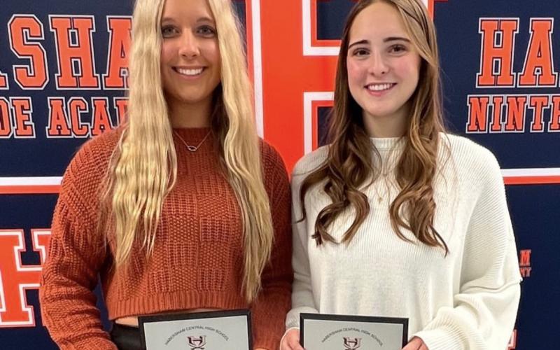 Varsity cheerleaders Addie Shubert (left) and Molly Tipton were honored for their outstanding leadership at the Hab Central competition cheer banquet earlier this week. SUBMITTED