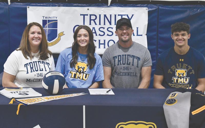 The Ward family including (from left) Jana, Madison, Seth and Sy snap a photo following Madison’s signing to play volleyball at TMU next year. LANG STOREY/Staff
