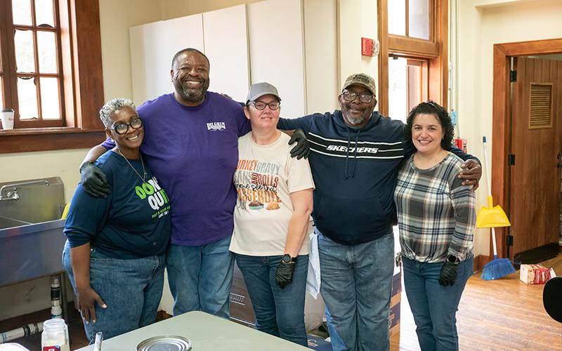 Cynseria Jenkins, Steven Hill, Shanna Adams, Bishop Billy Jenkins Jr. and Doris Negron stand for a photo in the kitchen amidst the culinary chaos of the busy Thanksgiving Day. Greater Mount Pleasant Church, Nowhere2Turn Ministries and Sam Negron of Prince of Peace Church in Baldwin were the ministries involved, among sponsors McGahee Griffin &amp; Stewart, Rustic Rebel, Shear Perfection Salon, Wolf Creek BBQ and Hillside BBQ. ZACH TAYLOR/Staff