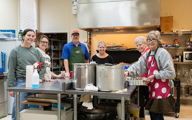 Maggie Jackson, Wendy Jackson, Darrin and Leigh Johnston, Claudia Jessup and Tina Evans stand for a photo in the fellowship hall of Clarkesville First Presbyterian Church after serving more than 415 meals on Christmas Day. Volunteers not pictured are Brian, Jack, Caroline and Mary Beth Horton, Don, Sean and Hunter Nix, Chris, Katherine, Collin, Caleb and Claire Kelly, Abby Good, Rev.Matt Henderson, Jeff and Will Jackson, Katie and Joe Hardy and Brian Jones. ZACH TAYLOR/Staff