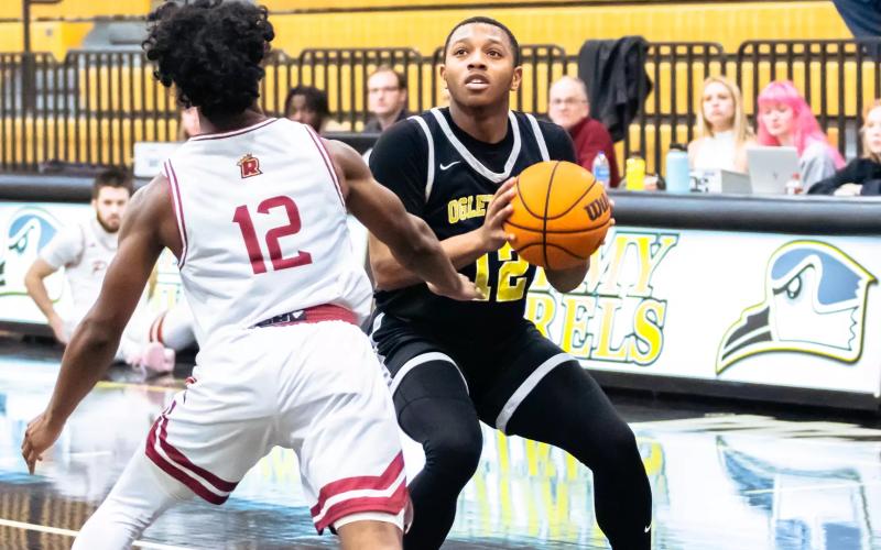 6677: Junior guard Malachi Dooley has taken his game to the next level this year for Oglethorpe. MELANIE DAVIS/Oglethorpe Athletics