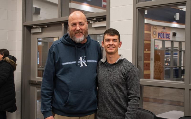 From left, STAR Teacher Karl Mealor and STAR Student Joshua Burris smile for a photo in the Habersham Central front office. Burris earned his STAR Student status by earning the highest SAT score in his grade level, and has chosen Mealor as his STAR Teacher due to the positive impact he has created in Burris’ life over the past year. HANNAH CAUDELL/Staff