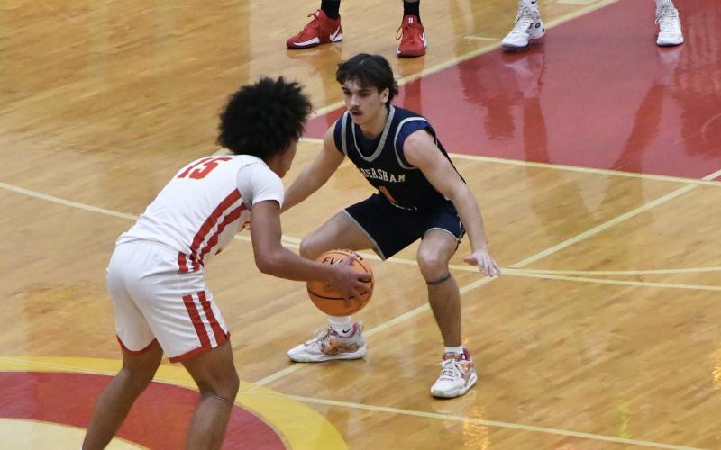 Habersham senior guard Caden Garrison locks down on defense during a recent game for the Raiders. Garrison’s strong defensive play has come up clutch for HCHS throughout the year. LANG STOREY/Staff