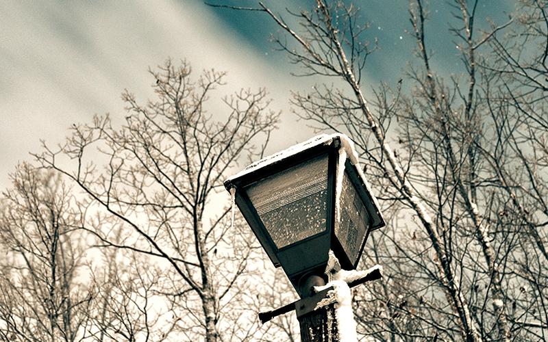 Icicles hang from a street light with snow accumulating on the post from high winds in recent years. ZACH TAYLOR/Staff