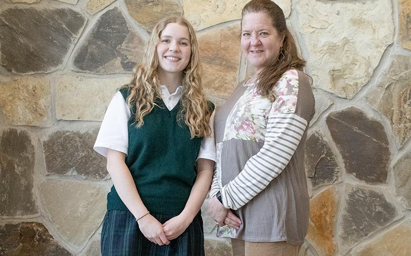 From left, STAR Student Marina Dumas and STAR Teacher Kelli Bly of Tallulah Falls High School stand by each other’s side for a photo. Dumas was awarded with the STAR student recognition after scoring the highest marks on the SAT in the school system. Bly was chosen by Dumas for the STAR Teacher award. HANNAH CAUDELL/Staff
