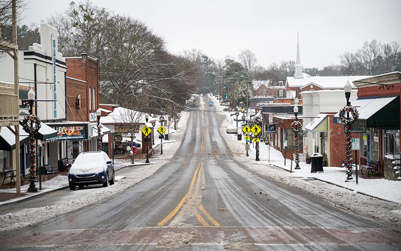 Washington Street in Clarkesville was well-treated on Friday afternoon. GDOT crews kept the street salted and plowed to keep emergency crews safe. ZACH TAYLOR/Staff