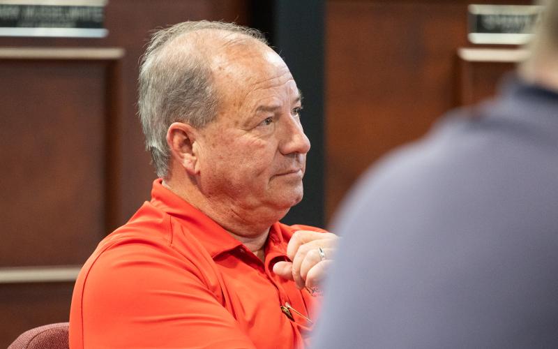 Demorest City Manager Mark Musselwhite listens intently to the Food 4 Kids presentation in Tuesday evening’s work session. Musselwhite received a three percent raise after signing a new contract on Wednesday. ZACH TAYLOR/Staff