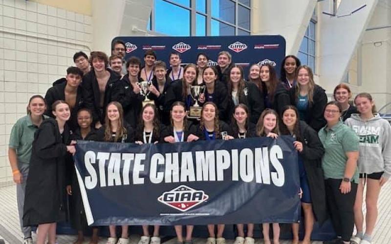 The TFS swim team poses after winning the state title in their first year as a member of GIAA. SUBMITTED