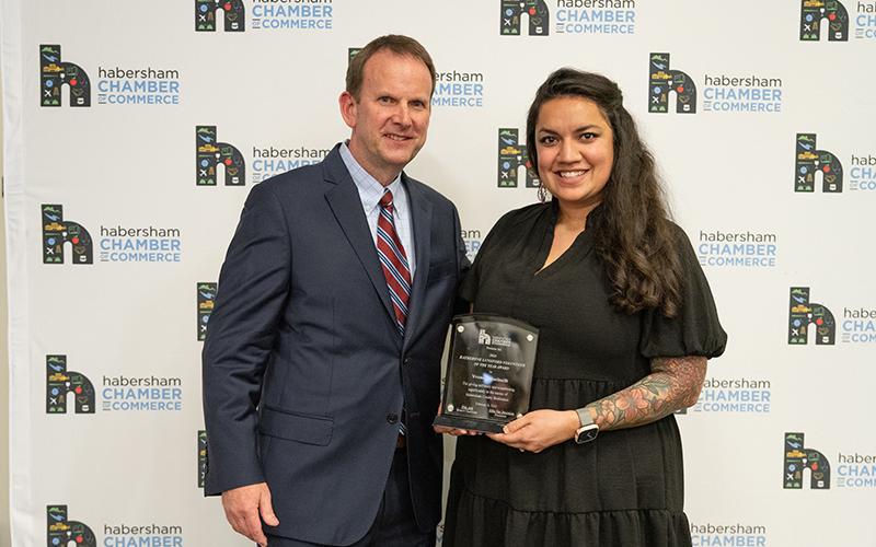 Keith Barlow (left) presents Yvonne Marinelli (right) with the Katheryne Lunsford Volunteer of the Year Award. ZACH TAYLOR/Staff
