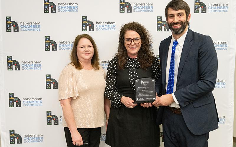 Susan Ramsey presents Caroline and Kyle Lewallyn of teXga Farms with the Business of the Year Award. ZACH TAYLOR/Staff