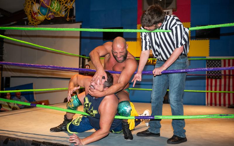 The main event card at the Rodney Hix wrestling event on Saturday featured Wild Billy Buck and Sal Rinauro, with adversary Tristan Michaels as the referee. ZACH TAYLOR/Staff