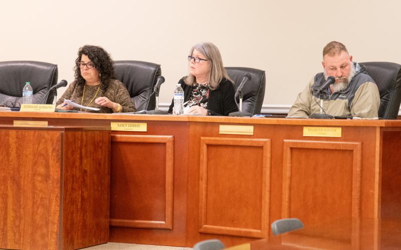 Baldwin Mayor Stephanie Almagno and City Councilmembers Nancy Lehman and Maarten Venter listen attentively to residents’ concerns about their water bills. ZACH TAYLOR/Staff